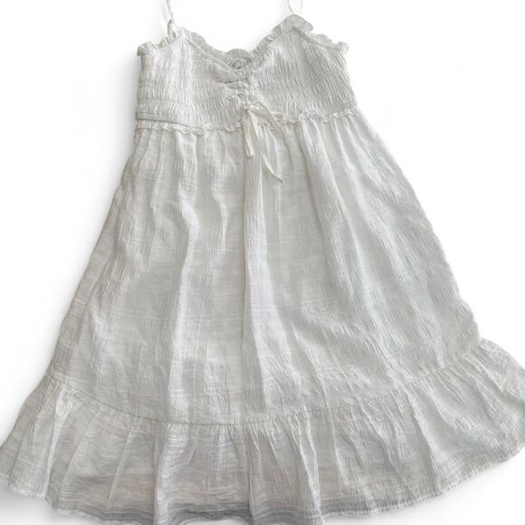 White cotton babydoll dress with ruffles and tie detail - Picture 1 of 5